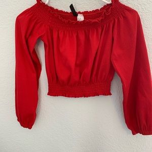 red long sleeve top